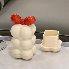 Bow toothpick and cotton swab holder